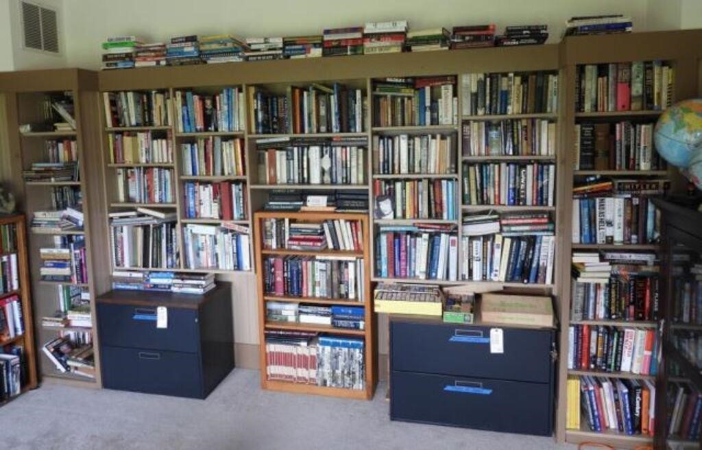 Massive selection of books on wall in various