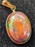 $900 14K  Enhanced Opal(5.5ct) Pendant