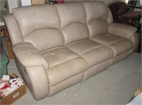 Leather reclining sofa. Measures 87" long.