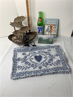 Water fountain placemats bottle canvas and book