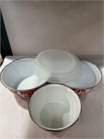 Metal bowls with lids, large one has 2 worn