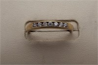 10K Yellow gold ring with 7 CZ stones size 9.25.