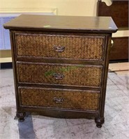 Dark wood and cane style three drawer side