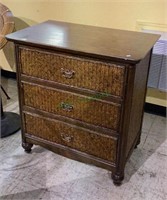 Dark wood and cane style three drawer side
