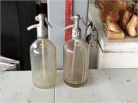 2 seltzer bottles