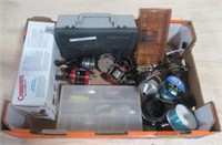 Assorted fishing reels and related items.