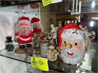 Group of decorative items including Santa and Chri