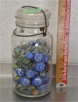 Vintage canning jar of marbles