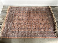 Persian-style area rug, 78" x 54”