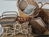 Wicker baskets and multiple tiny Wicker chairs.