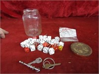Jar of dice, dog whistle, keys.