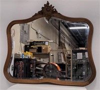 Vintage hand-carved wall mirror, beveled glass