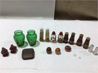 Assorted salt and pepper shakers, salve tins,