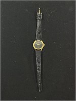 Gucci watch with genuine leather not sure of auth.