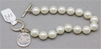 Sterling Silver pearl bracelet.