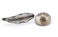 Two figural silver brooches