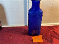 One vintage blue poisons bottle