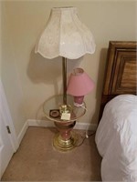 Unusual brass and glass lamp table