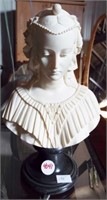 A. Gionnelli bust on stand. Measures 9" tall.
