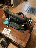 Vintage singer sewing machine with cabinet