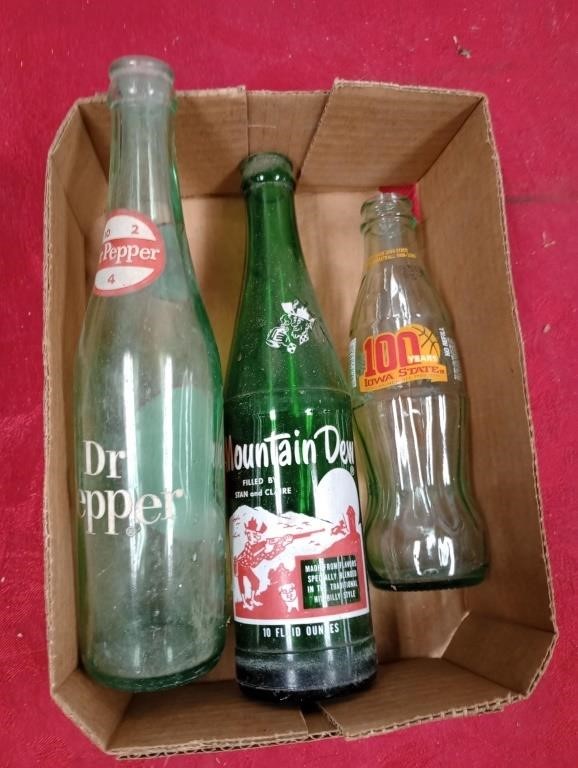 dr pepper, mt dew and coca cola bottles