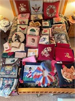 Variety of place mats, pillows, napkins, runner
