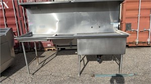Meat cutting sink with garbage station, and
