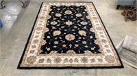 Black and Tan Floral Area Rug