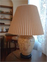 Chinoiserie White ceramic floral lamp. It does