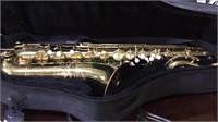 Vintage brass tenor saxophone, with mouth piece,