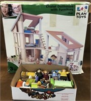 Plan Toys chalet dollhouse with extras