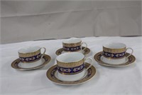 Four Limoges cup and saucers
