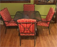 5 piece Outdoor patio set. Table with glass top,
