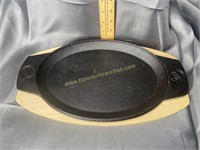Cast iron steak plate with wooden base