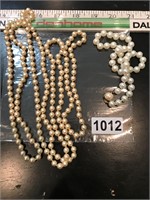 Long strand pearl necklace and smaller one