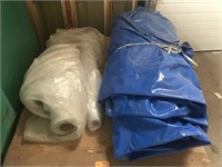 Two partial rolls of poly and a tarp. Length not