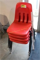 4 red stacking chairs