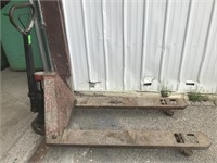 Used pallet jack may need hydraulic repairs as it