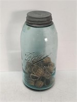 Bottle containing tiny woven baskets