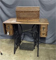 Singer Sewing Machine With Tiger Oak Case On Table