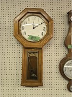Howard Miller oak regulator wall clock 30 in