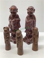 Lot of five carved oriental figurines - tallest