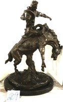 Cowboy on Bucking Bronco Bronze Sculpture