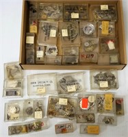 Watch Parts Organized in Small Boxes