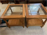 Two wooden and glass side tables