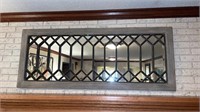 Framed mirror approximately 60” long x 24”. No