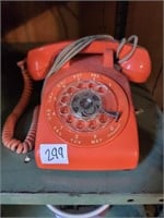 Vintage ITT orange rotary dial phone