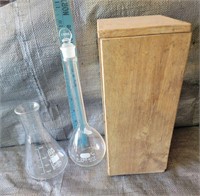 Microscope and Glass Beakers