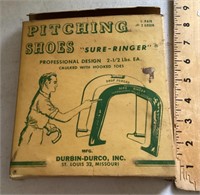 Pair of vintage horseshoes in the box