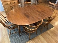 Wooden Table with 6 chairs & rug. Table measures